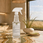 Raintree and Company Glass & Surface Cleaner back label, Lemongrass Prairie, on a swirled countertop