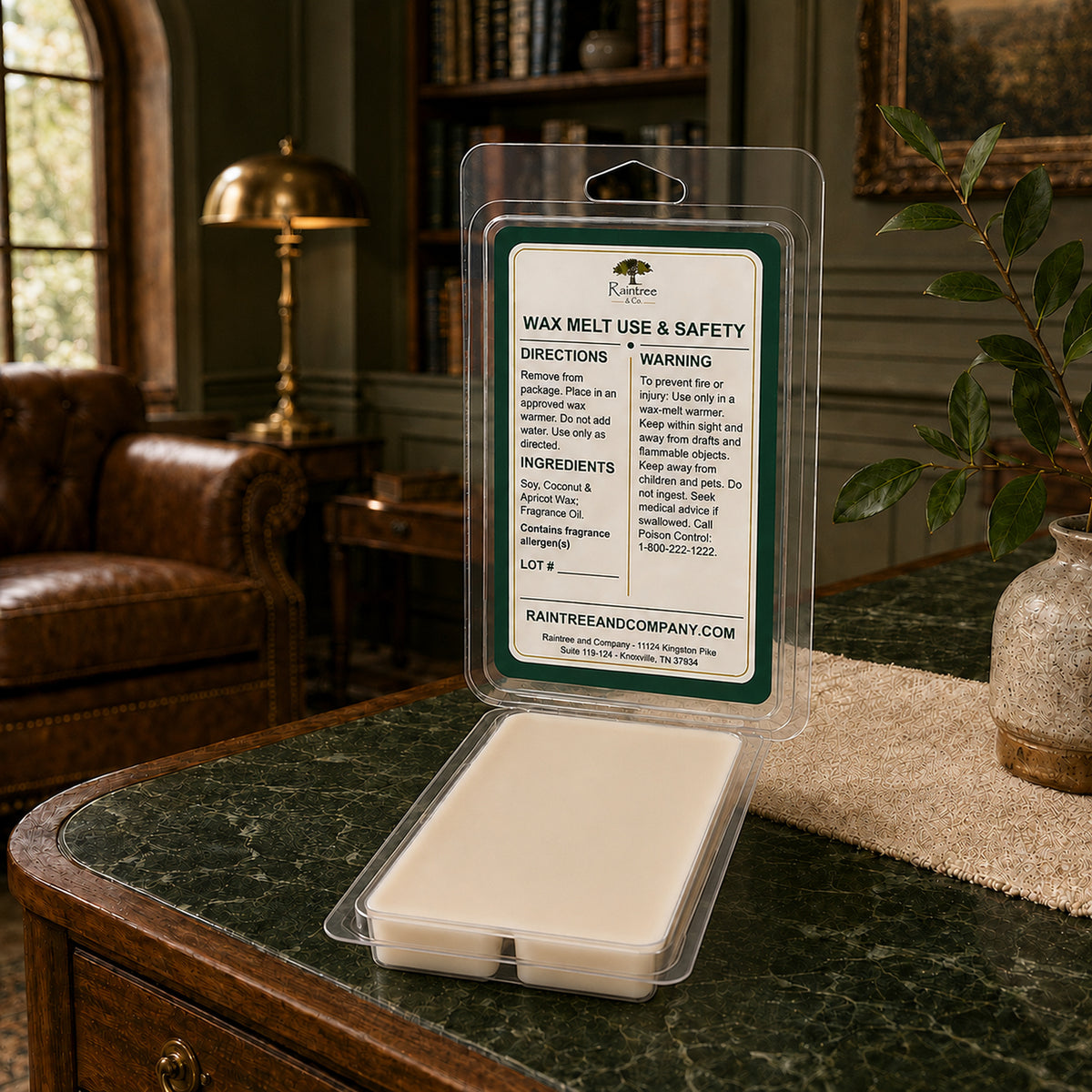 Raintree and Company wax melt clamshell open, showing ingredient label on the back