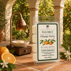 Raintree and Company 3oz Orange Grove wax melt clamshell on a veranda